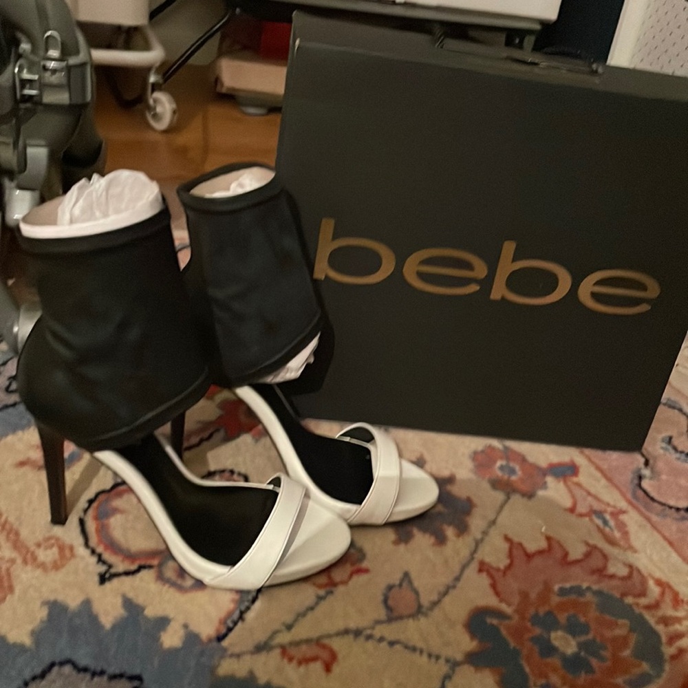 Black and white ankle heels from Bebe. Size 6